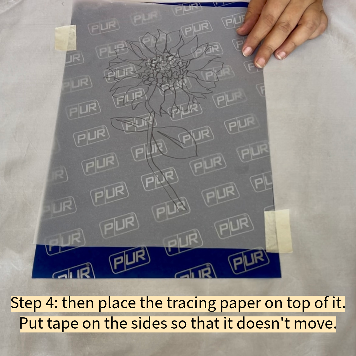 , then place the tracing paper on top of it. Put tape on the sides so that it doesn't move.