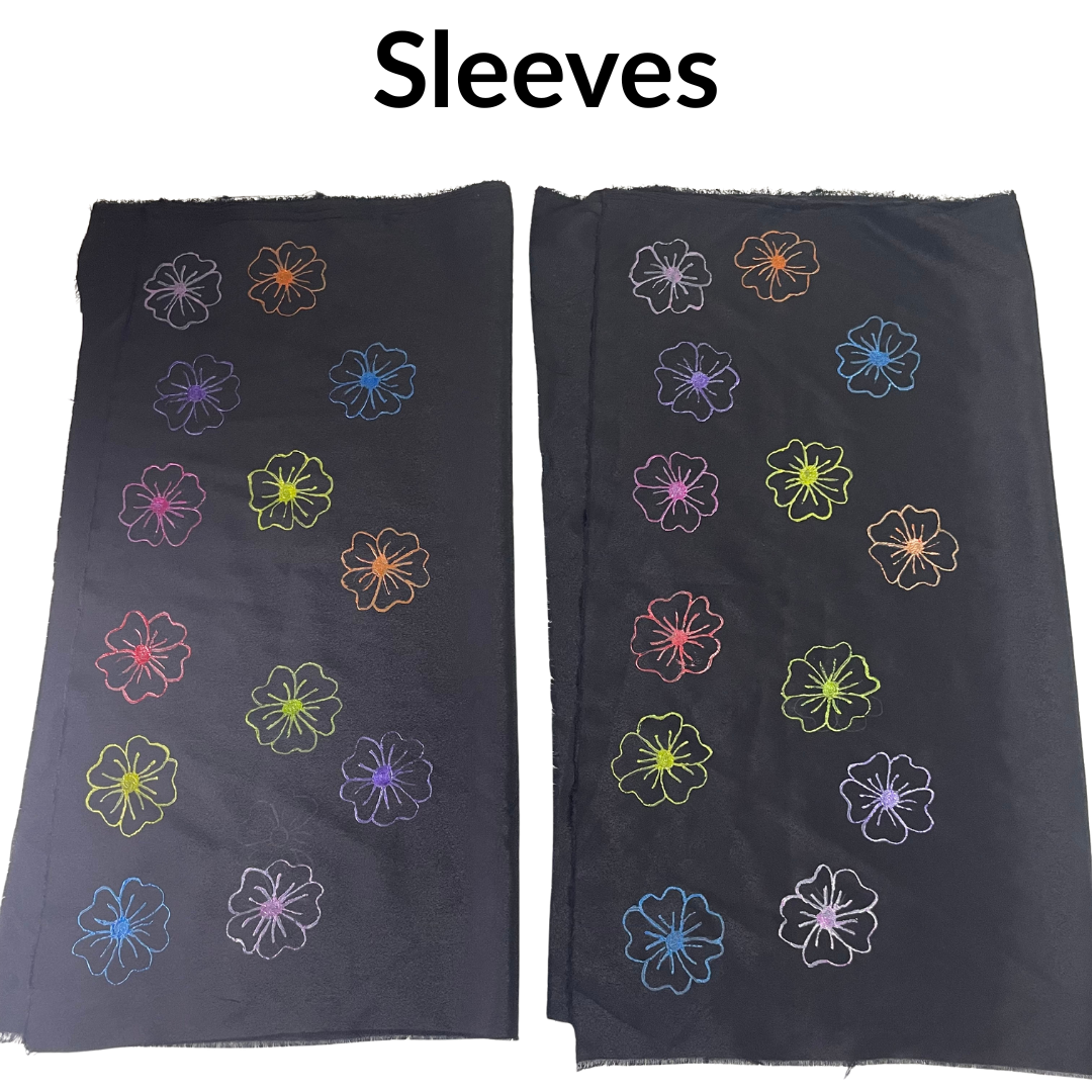 Two black sleeves with colorful floral patterns on a white background