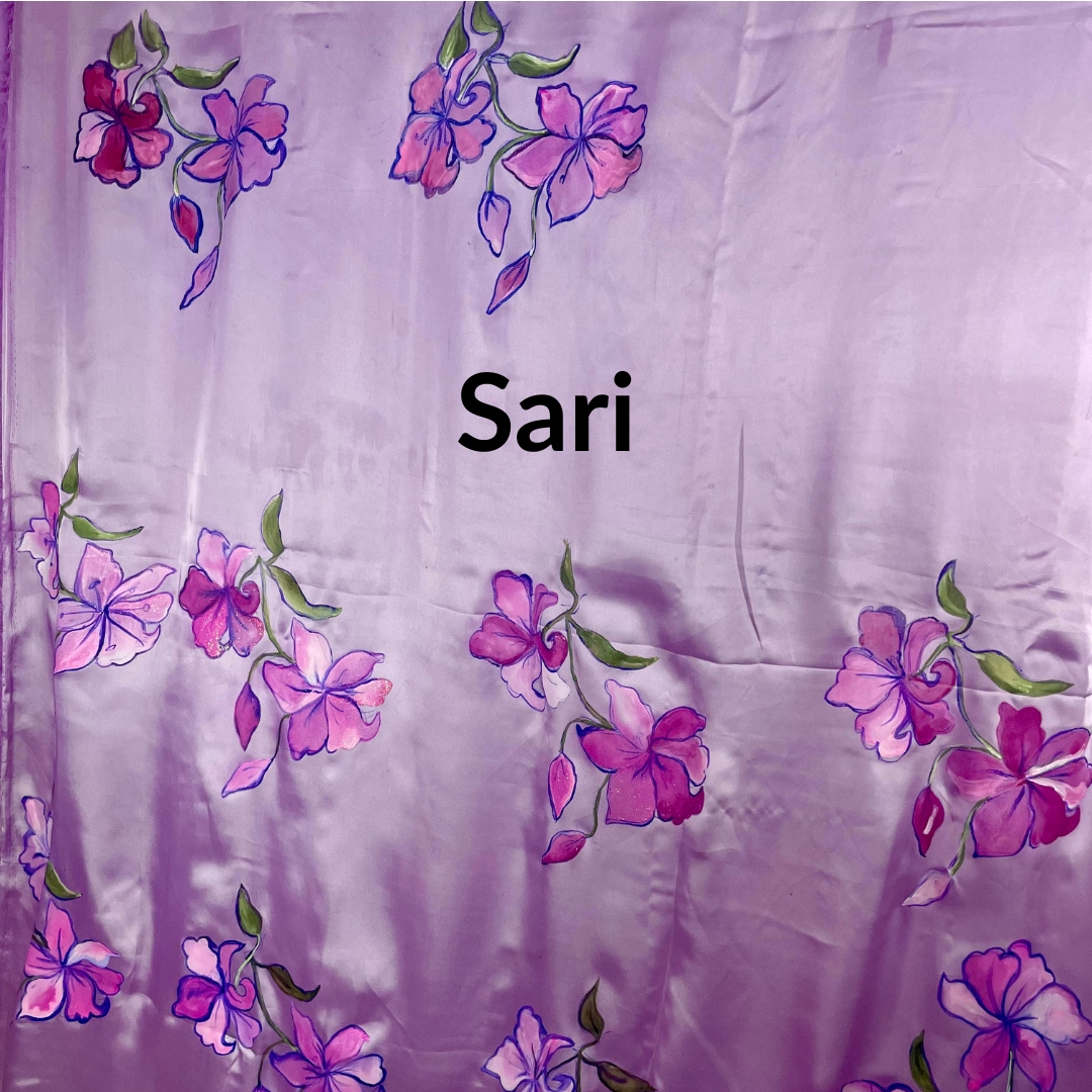 Purple saree with pink floral patterns and 'Sari' text